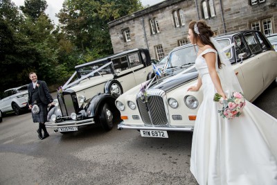 Bride and groom with Regent and Daimler