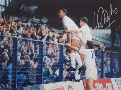 Vinnie Jones Signed Leeds United Kop Legend - Iconic Image on the railings celebrating scoring with the fans