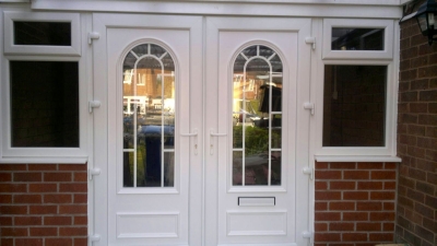 New build porch under existing open faced house.