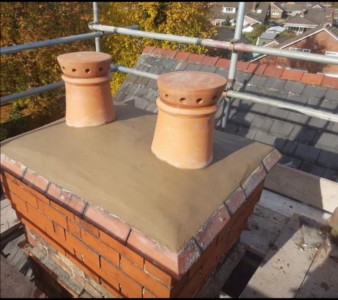 This chimney needed to be rebuilt with new pots to stop any rainwater causing damp to the property.