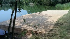 Large deck protruding over lake