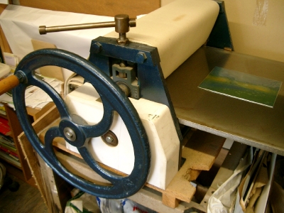 Etching press with plate