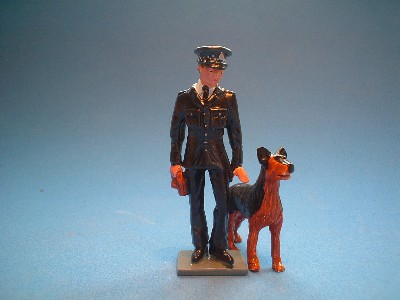 BRITISH DOG HANDLER STANDING DOG