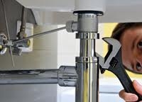 Emergency Plumber Altrincham fixing waste pipe