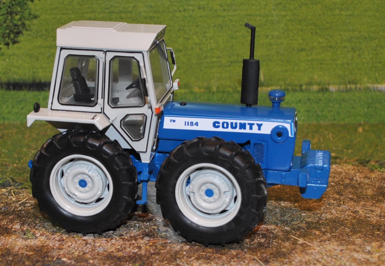 CV1007 COUNTY 1184 tw TRACTOR BLUE,UH BASED 