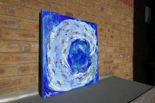 A large Abstract wave with a school of Fish