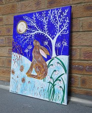 Hare Moongazing among thistles and snowdrops