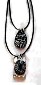 turtle and bone fish pendants
