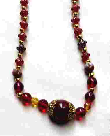 red gold necklace