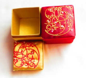 red and gold trinket boxes