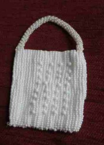 white beaded purse