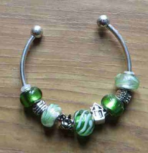 green pandora style bracelet, animal charm bracelet